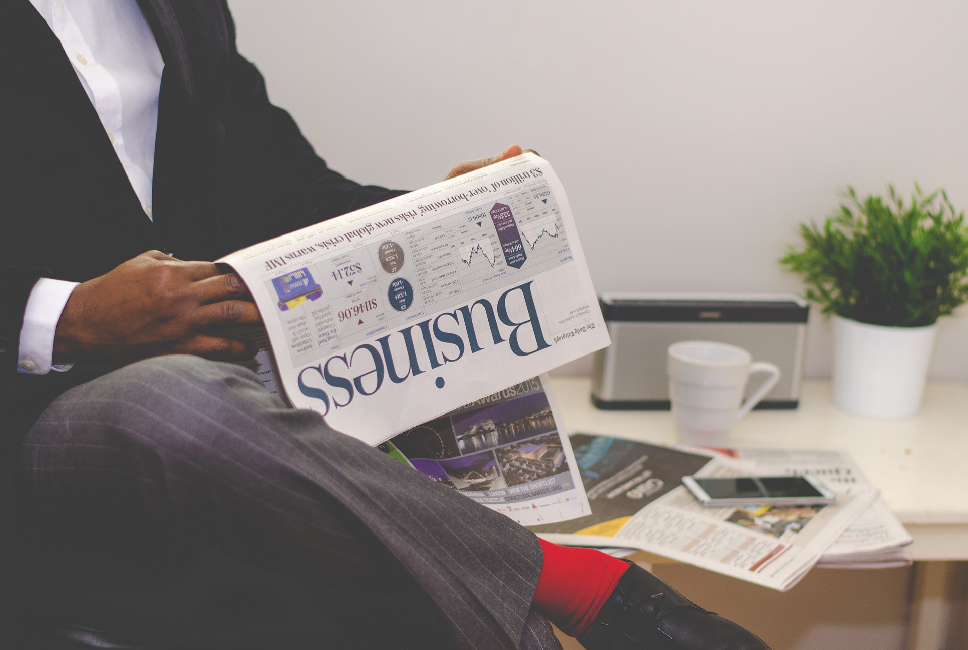 a man reading news