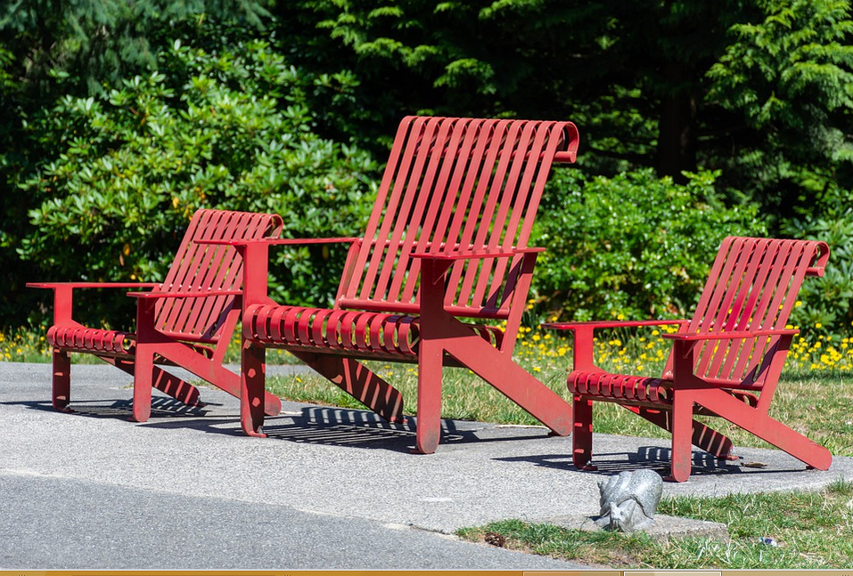 plastic picnic chairs in the park